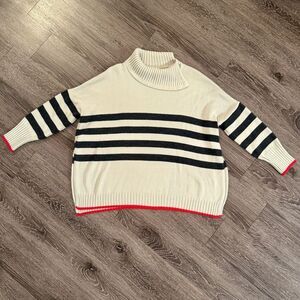 Mersea Marina striped tunic sweater in a black and white stripe with red trim